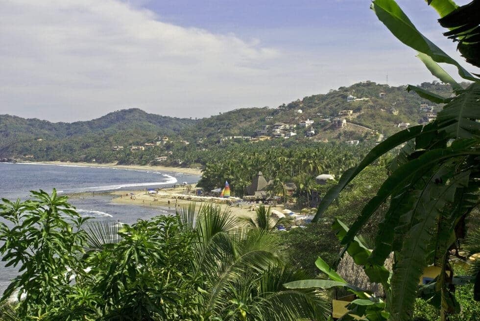 Resort shoreline waterfront with beach access and calm coastal scenery for Resort Concierge Escapes Reviews.