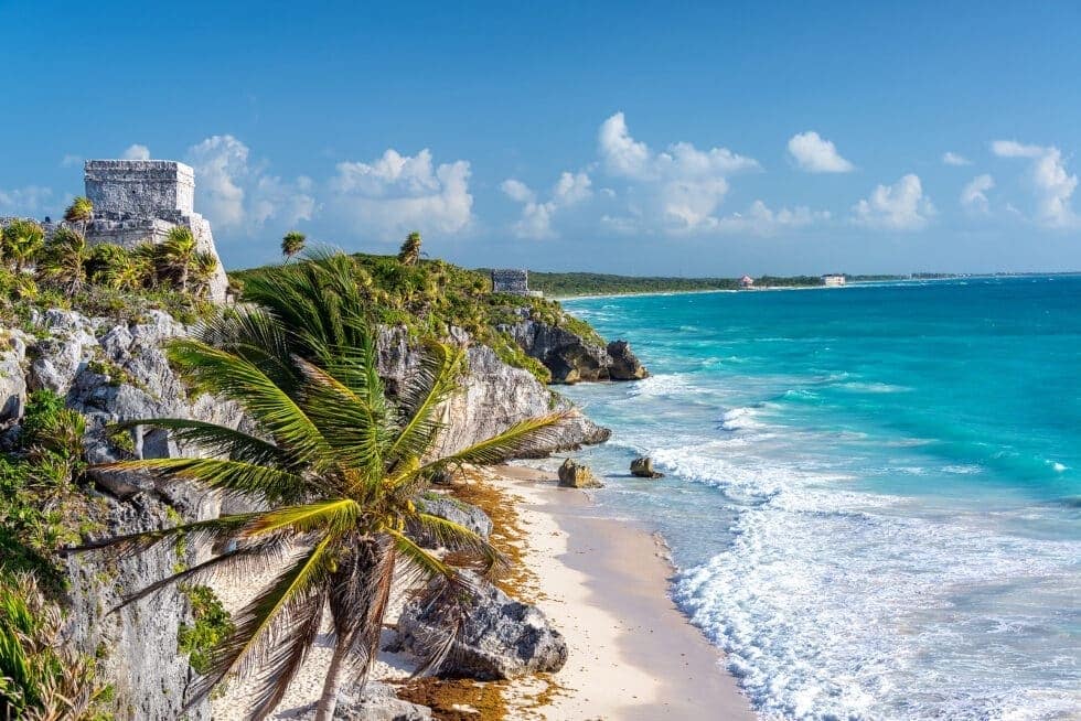 Rocky coastal bay with blue water and rugged shoreline texture for Resort Concierge Escapes Reviews.